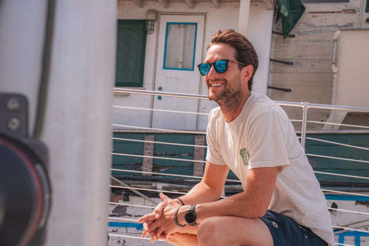 a man standing in front of a building