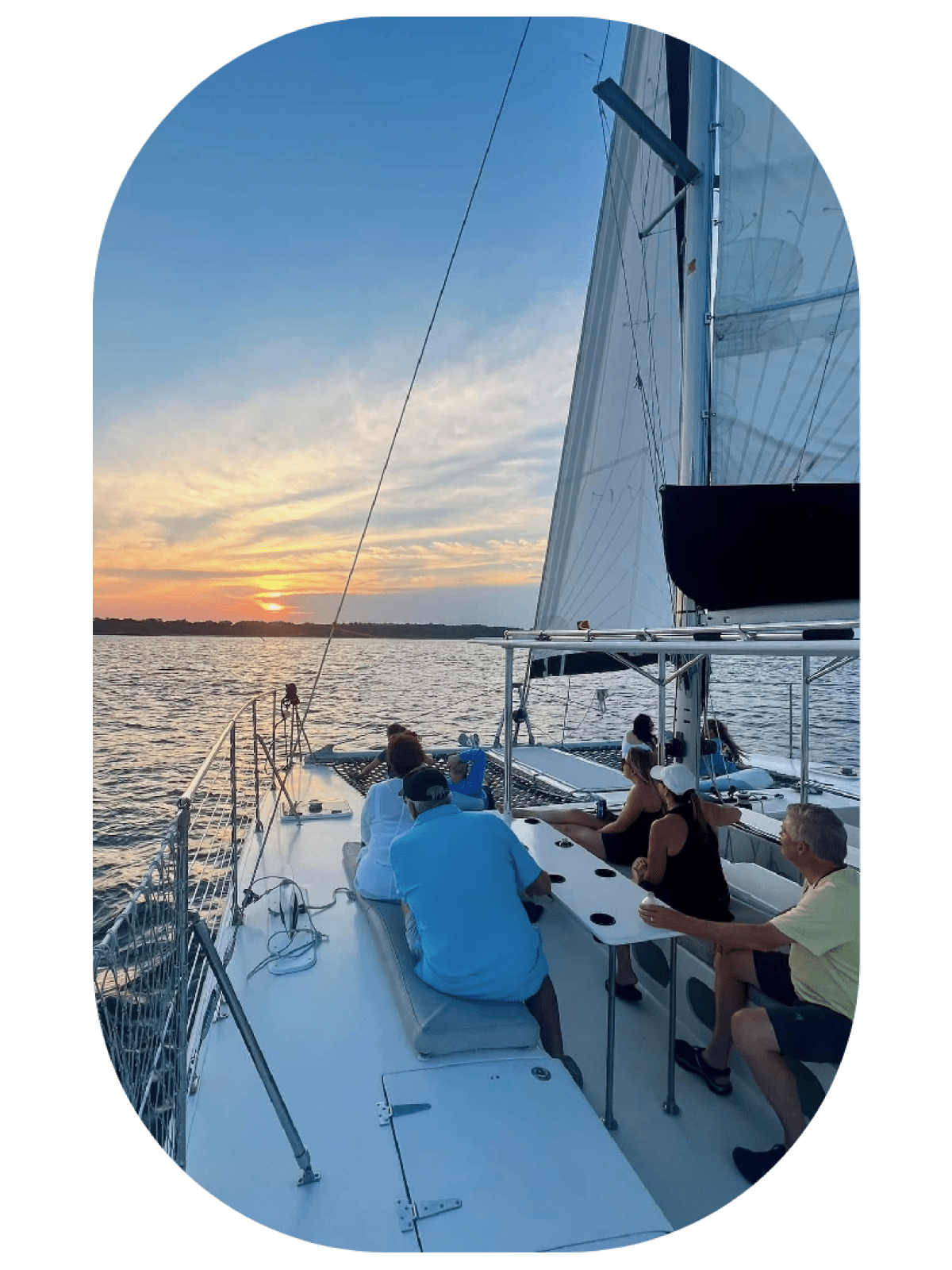 a group of people in a boat on a body of water